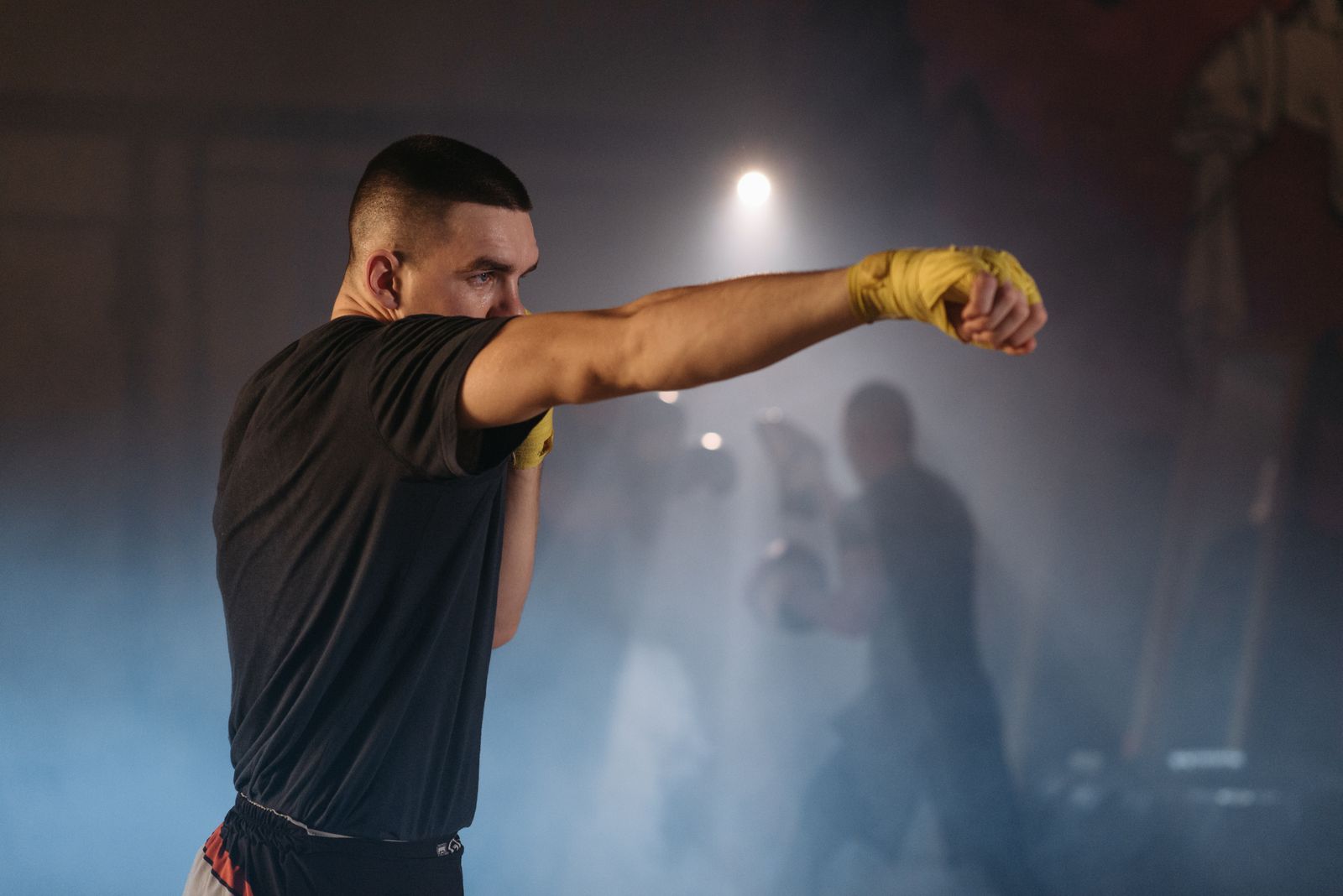 Boxer throwing a straight jab during training