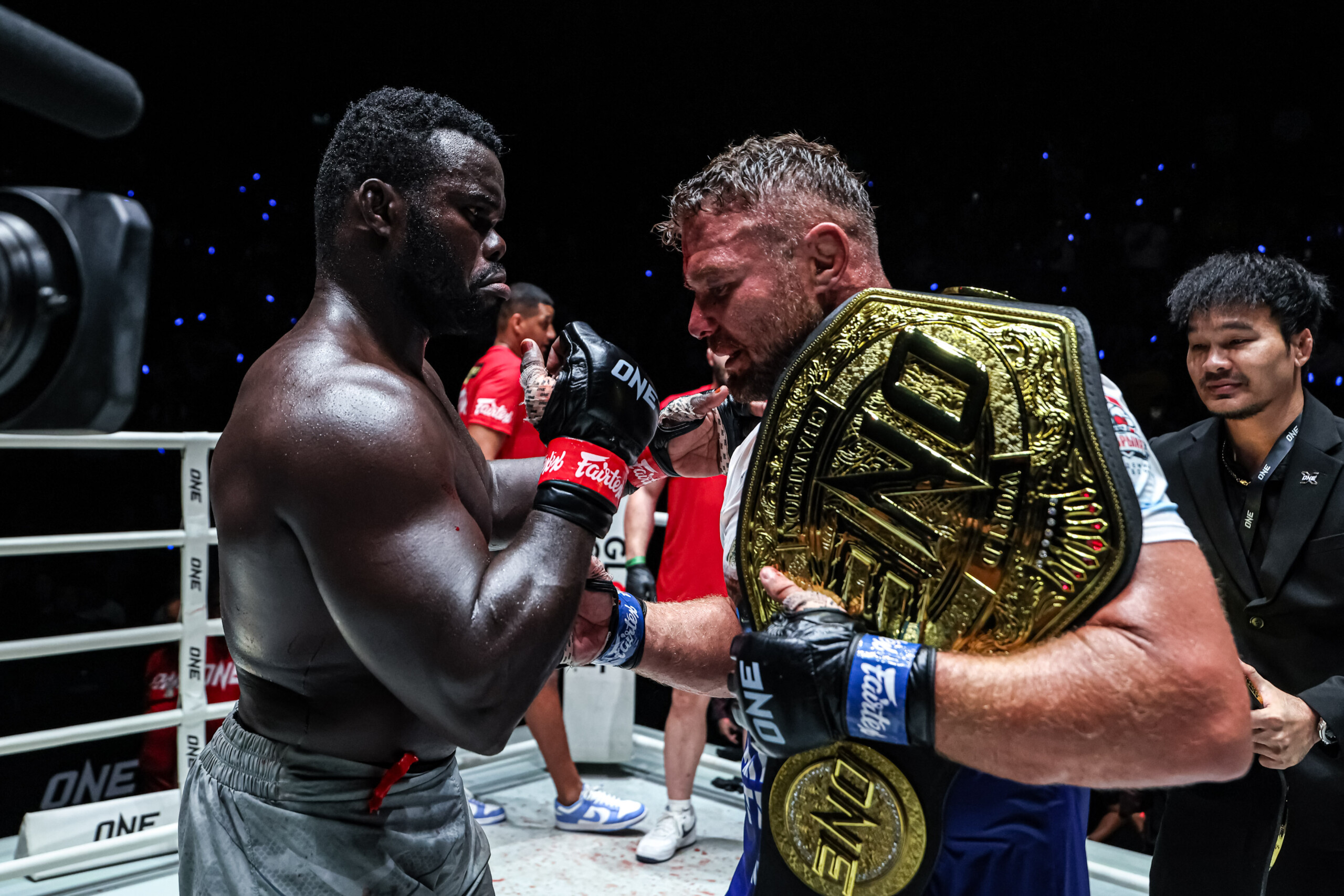 Anatoly Malykhin holds the ONE Heavyweight world title belt after knocking out Reug Reug in round four at The Inner Circle, May 15 2026