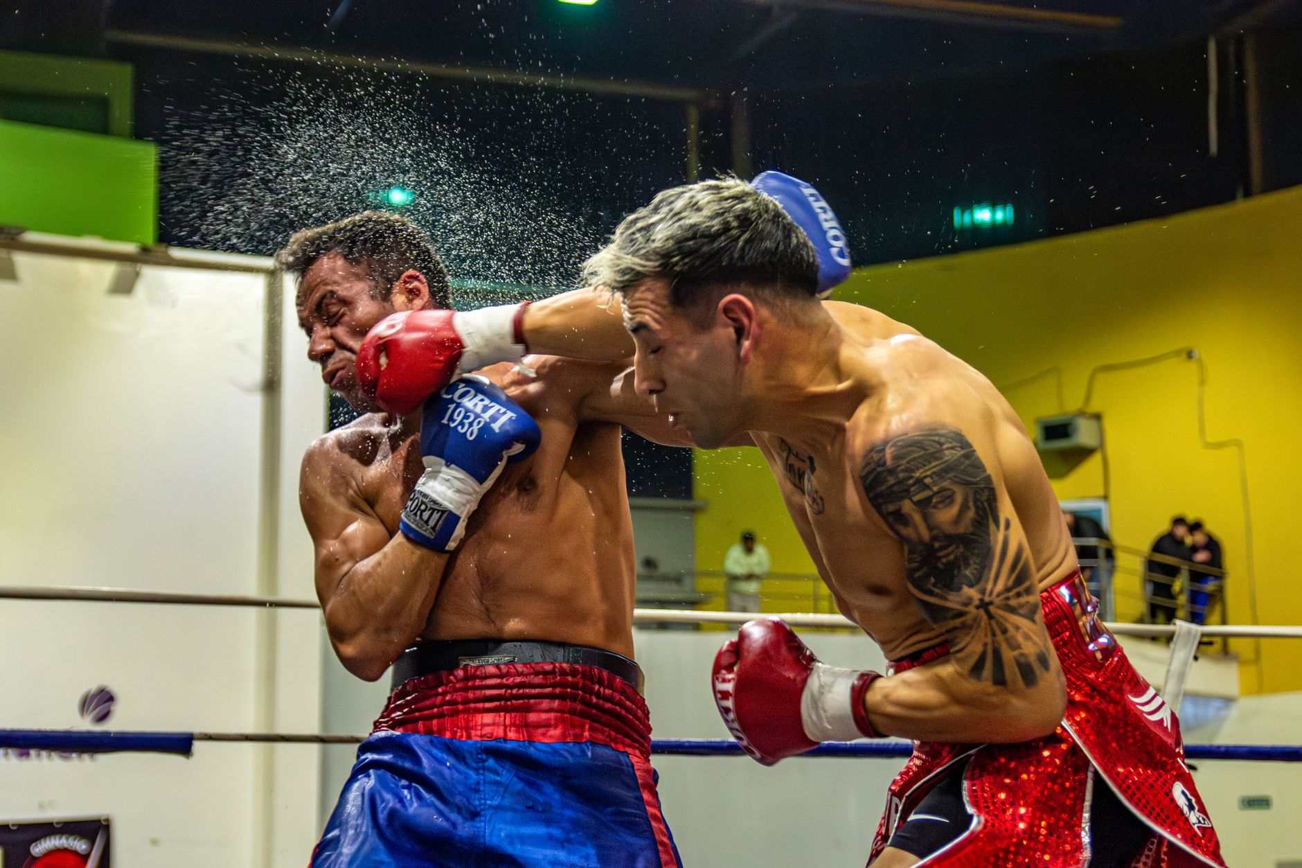 Powerful punch connecting in combat sports — striking fundamentals in MMA