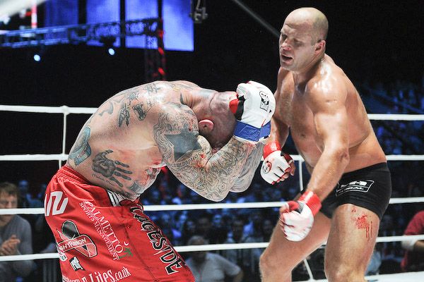 Jeff Monson exchanges strikes with Fedor Emelianenko in an MMA bout