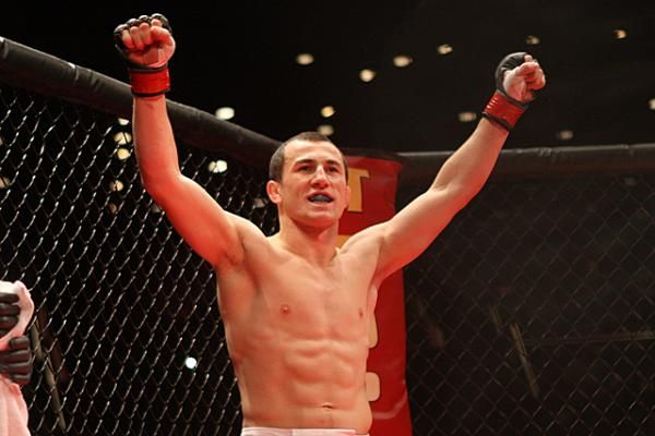 Merab Dvalishvili celebrates a win in the UFC octagon