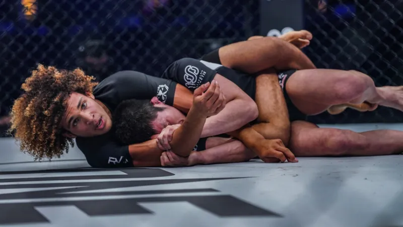 body triangle back control technique demonstrated in grappling competition