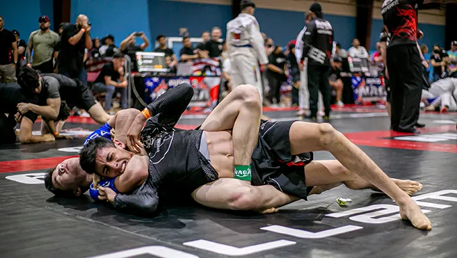 body triangle leg lock hold used to control an opponent's torso in grappling