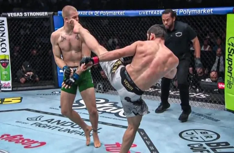 Islam Makhachev applies body triangle back control on Ian Machado Garry at UFC 330