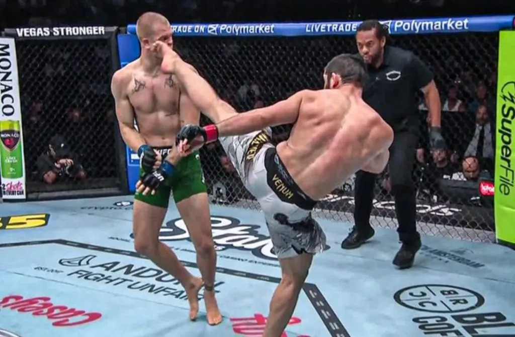 Islam Makhachev applies body triangle back control on Ian Machado Garry at UFC 330