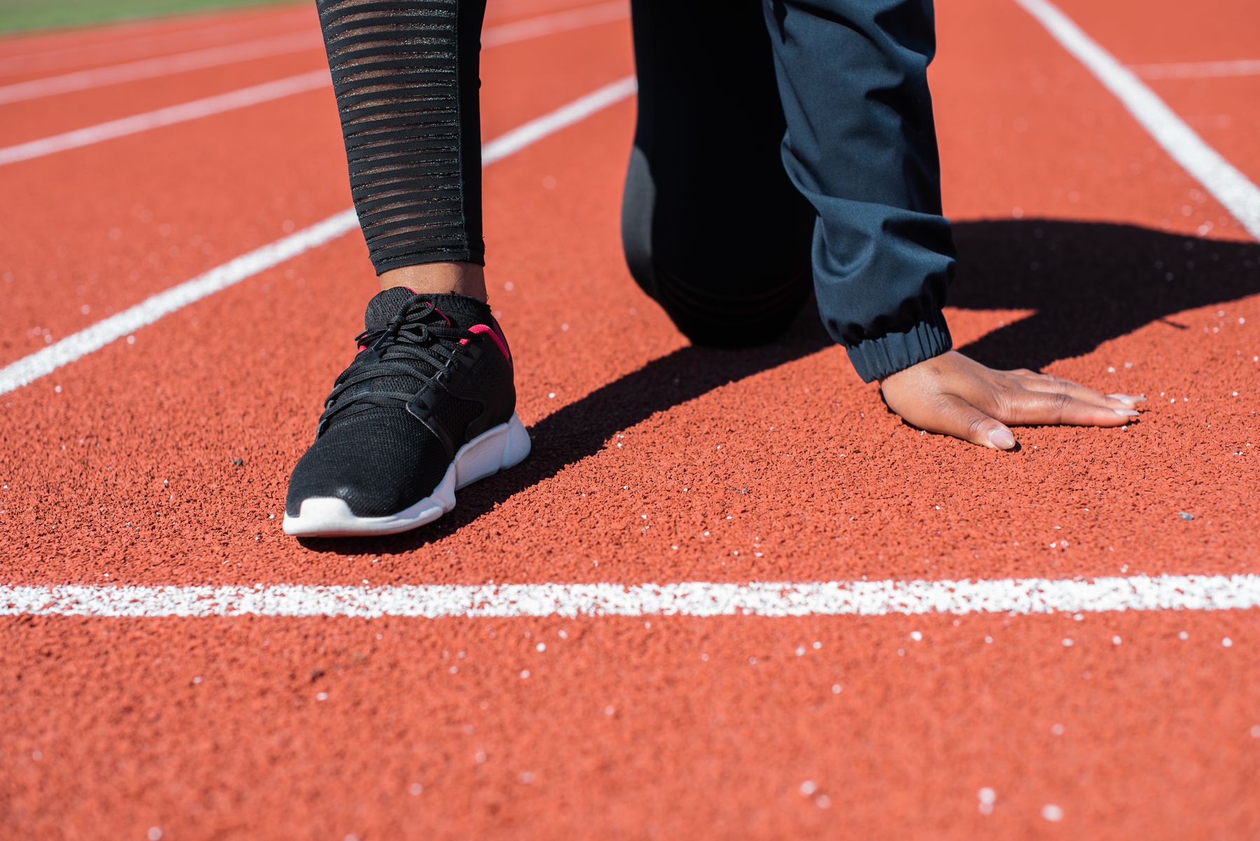 athlete doing sprint interval training outdoors