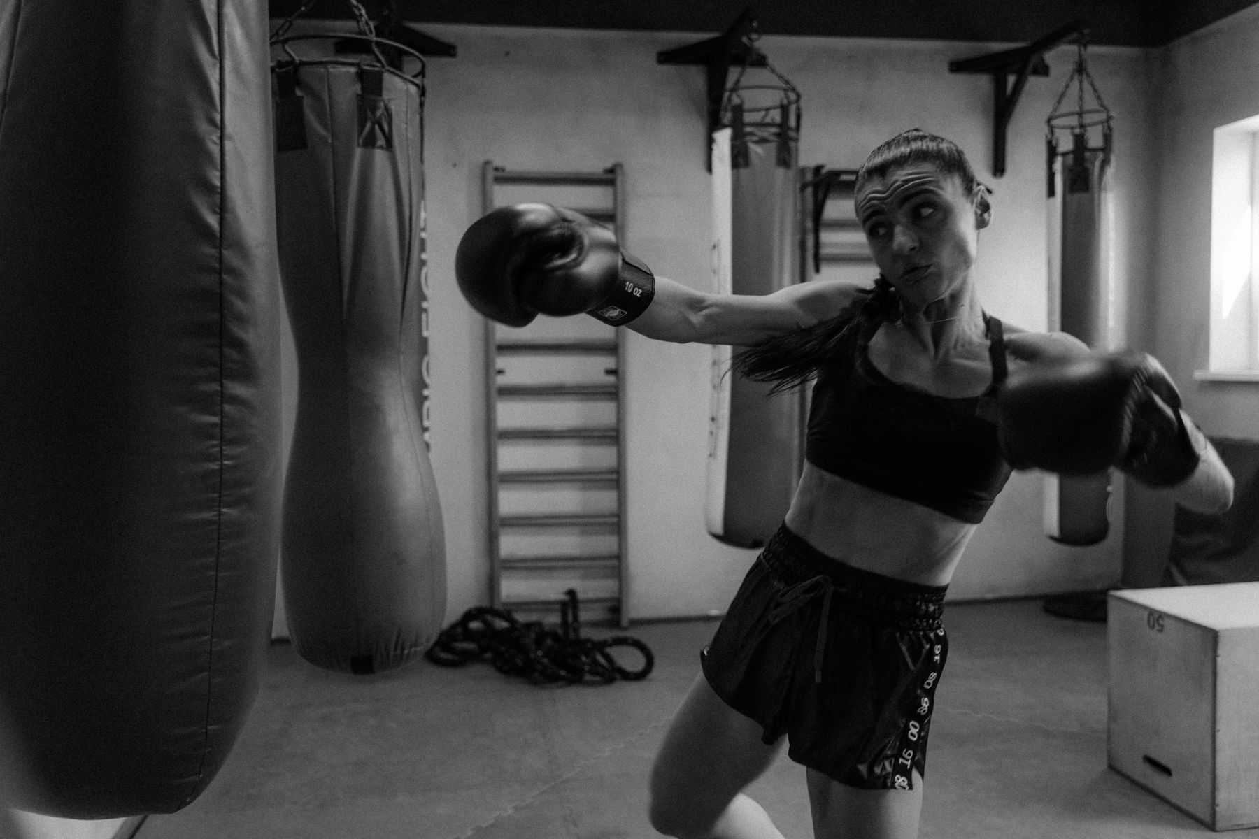 MMA fighter grappling in training, level change and takedown setup