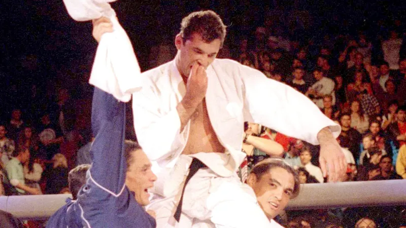 Royce Gracie celebrates becoming the first UFC tournament champion