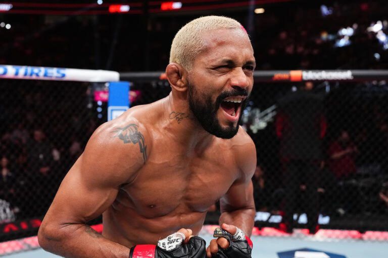 Deiveson Figueiredo celebrates in the UFC octagon before his UFC 332 bantamweight bout