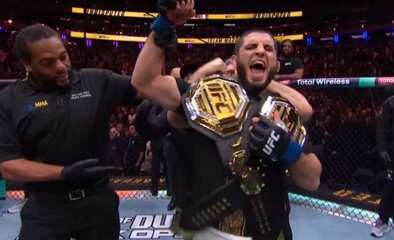 Islam Makhachev celebrates his second UFC title after dominant top control at UFC 322