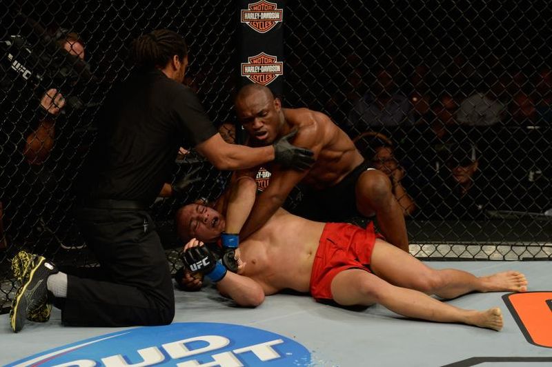 Kamaru Usman finishes an opponent with ground and pound early in his UFC career