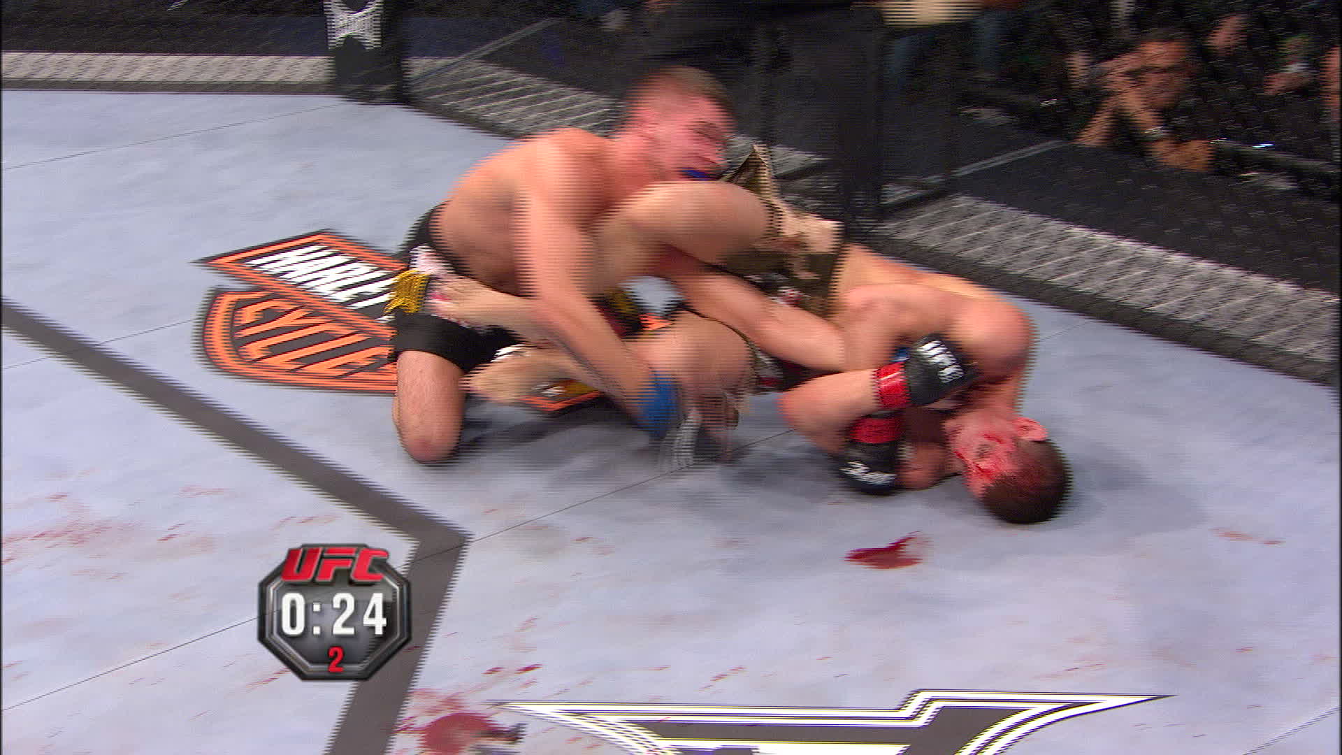 Joe Lauzon finishing a scramble armbar submission over Jeremy Stephens
