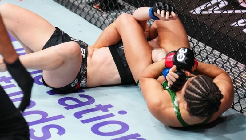 Loopy Godinez competing in the UFC strawweight division