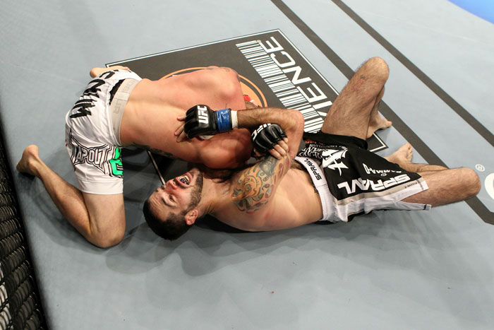 Chris Lytle finishing a reverse armbar submission over Matt Brown at UFC 116