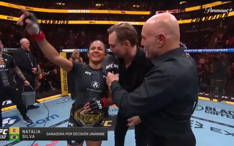 Natalia Silva celebrates winning the UFC flyweight title at UFC 332