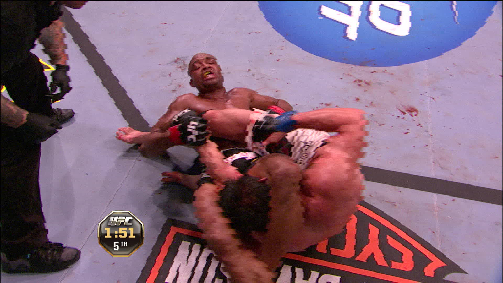 Anderson Silva finishing a triangle-to-armbar submission over Chael Sonnen at UFC 117