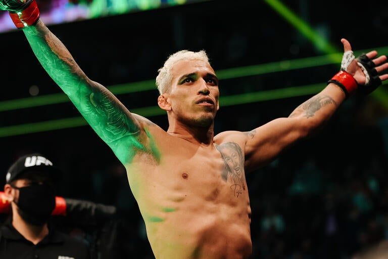Charles Oliveira, UFC submission leader with a career triangle choke finish