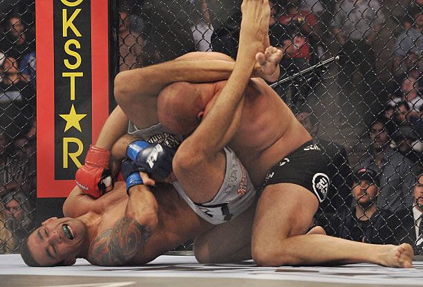 Fabricio Werdum locks in the triangle choke on Fedor Emelianenko